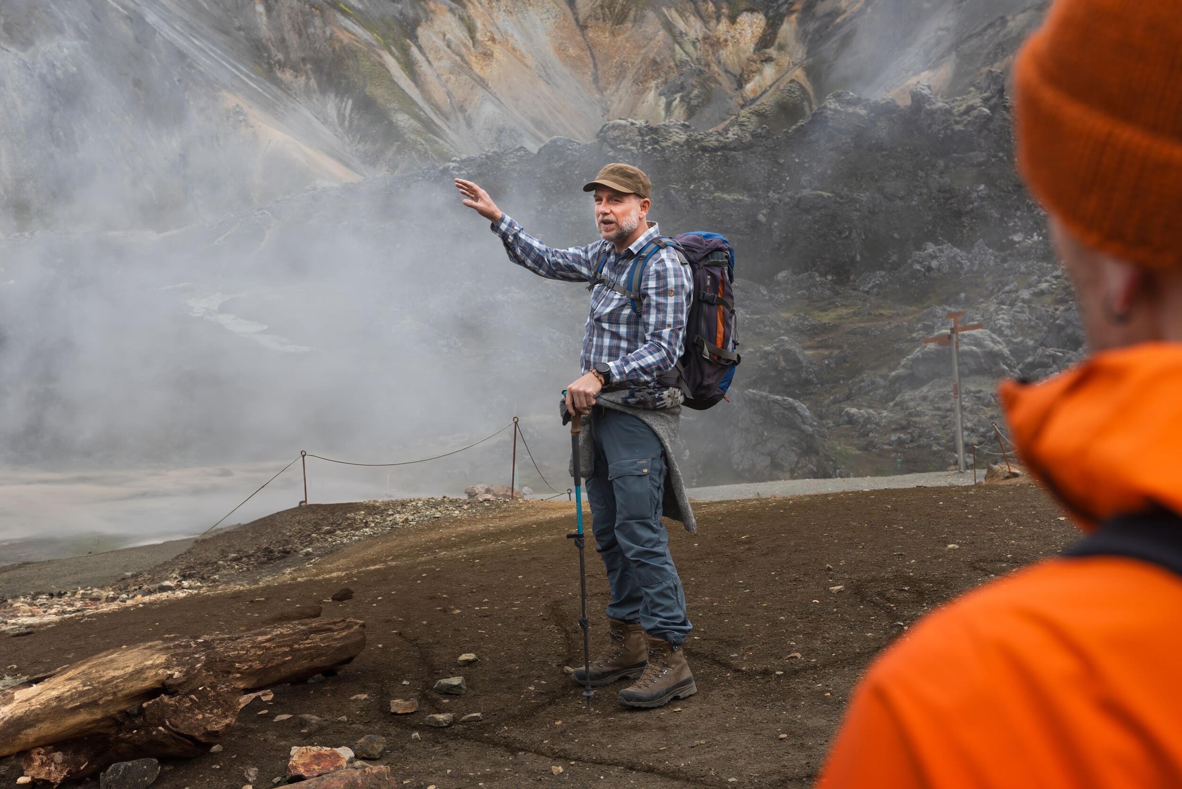 A guide during the Laugavegur trek in a steamy geothermally active landscape