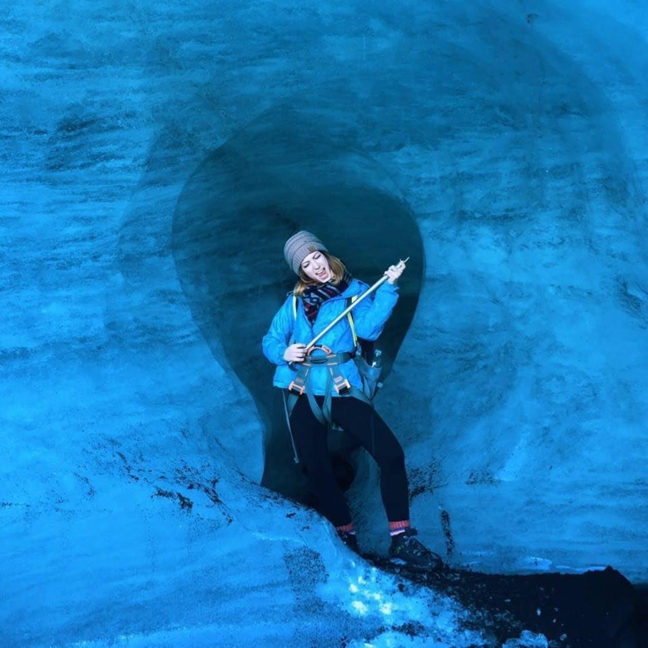 A woman inside a Ice cave