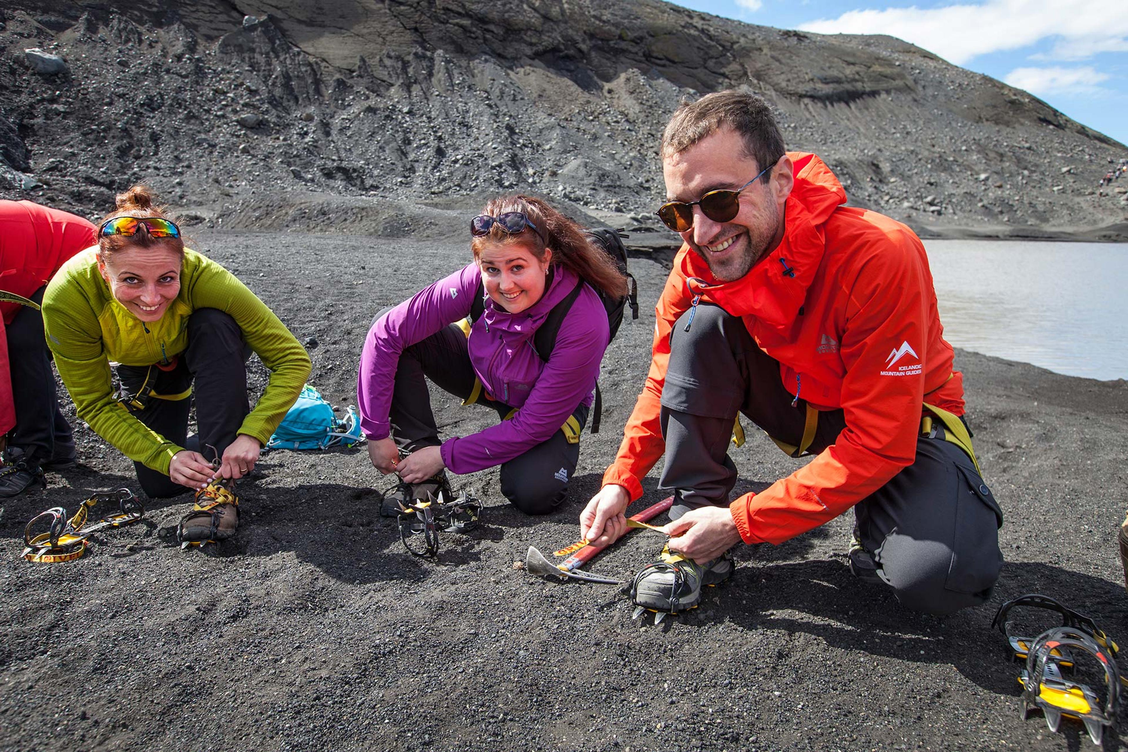 People getting ready for a glacier walk on Sólheimajökull with Icelandic Mountain Guides