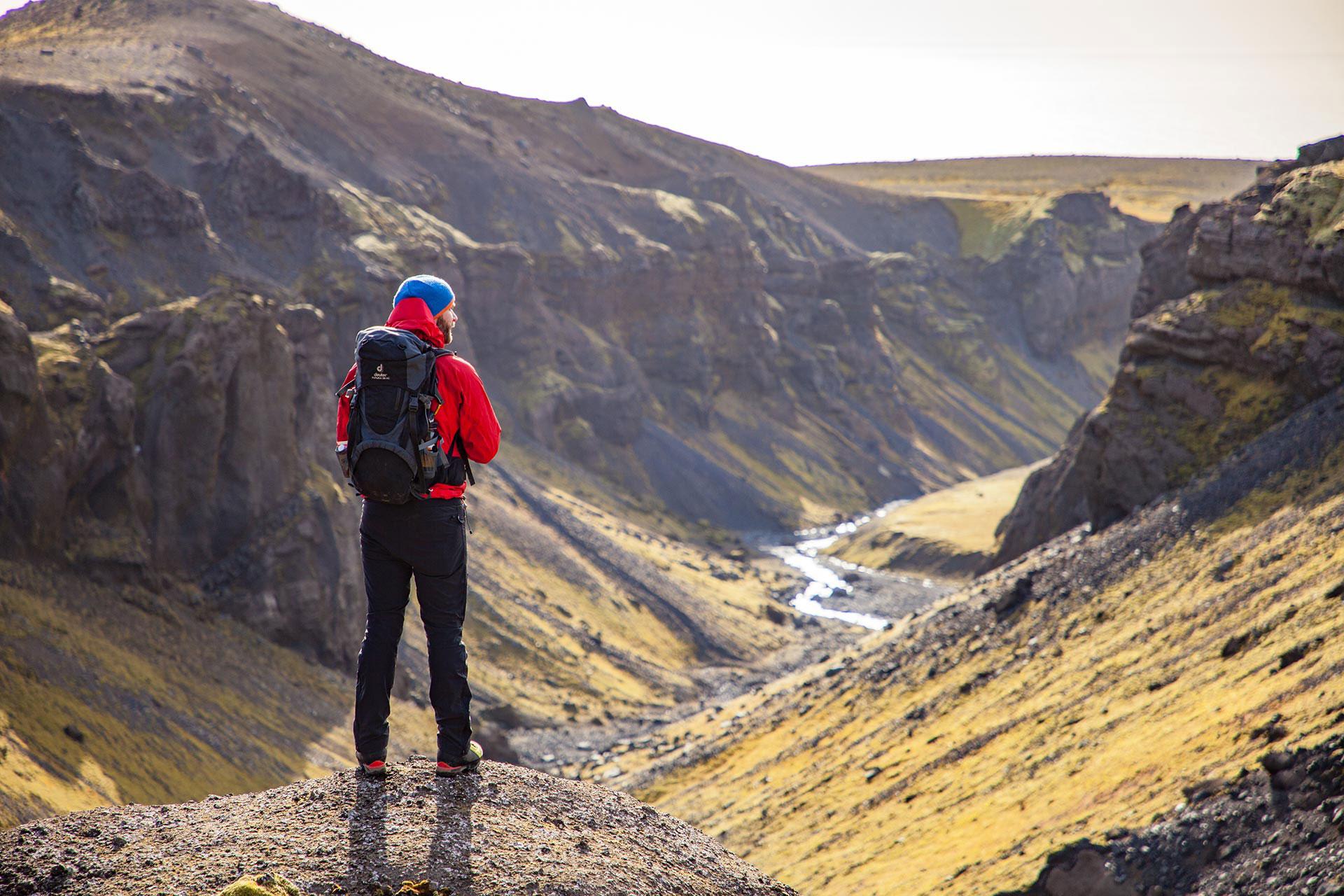 A guide looking down into the valley ahead