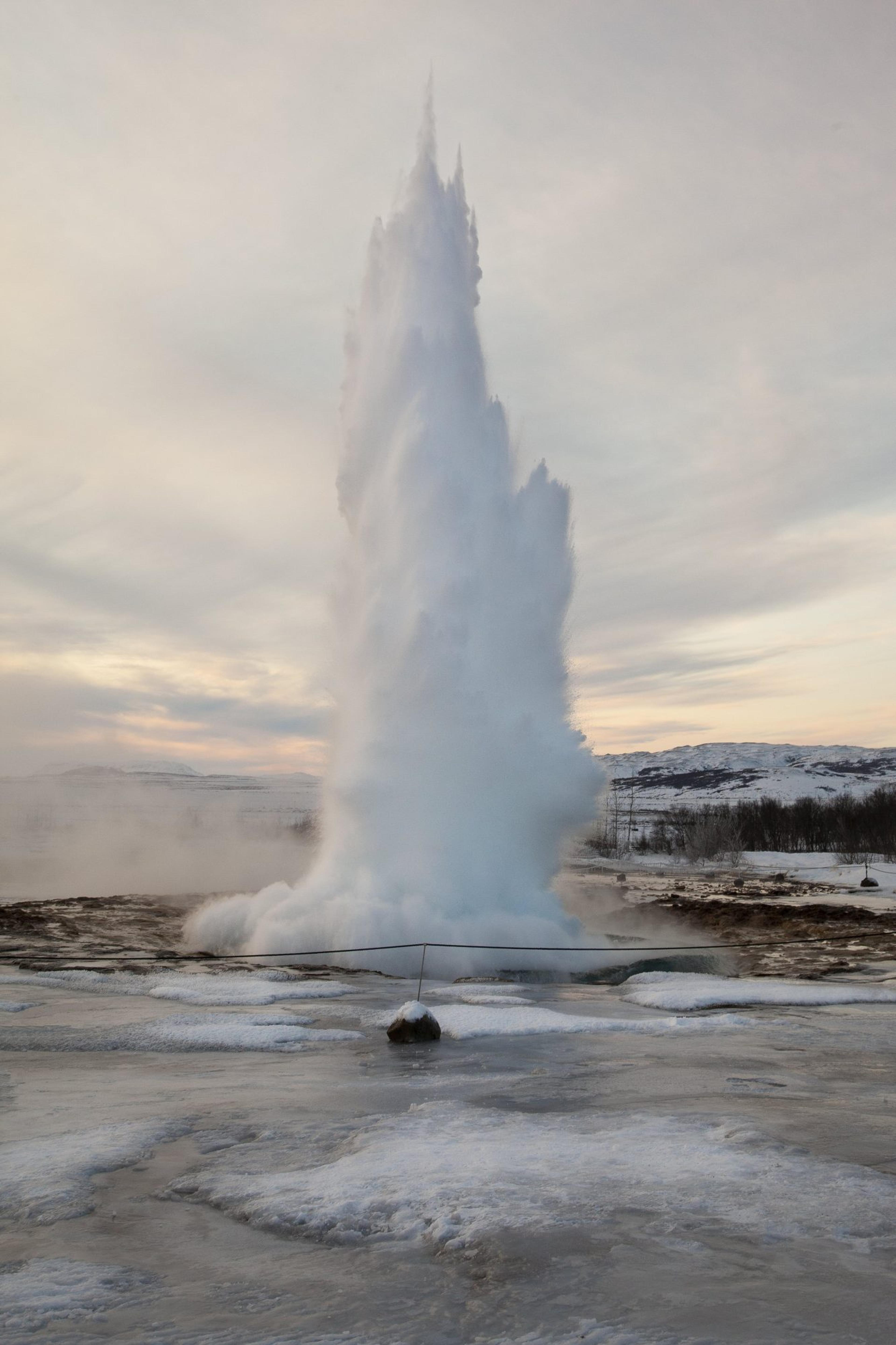 The geyser Strokkur erupting in winter