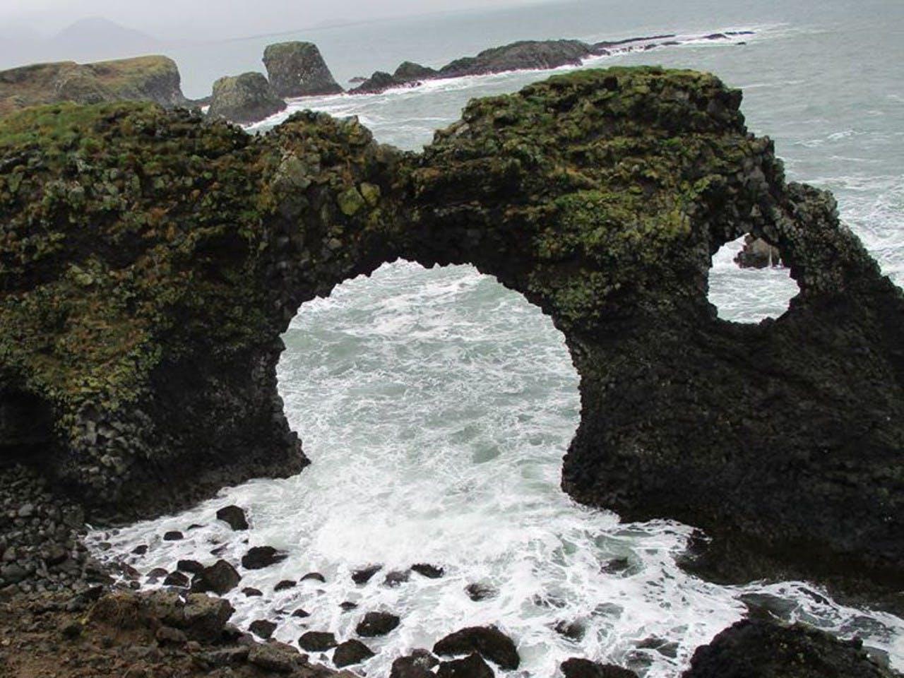 The coast at Snæfellsnes looking over the ocean on a fogy day in Iceland