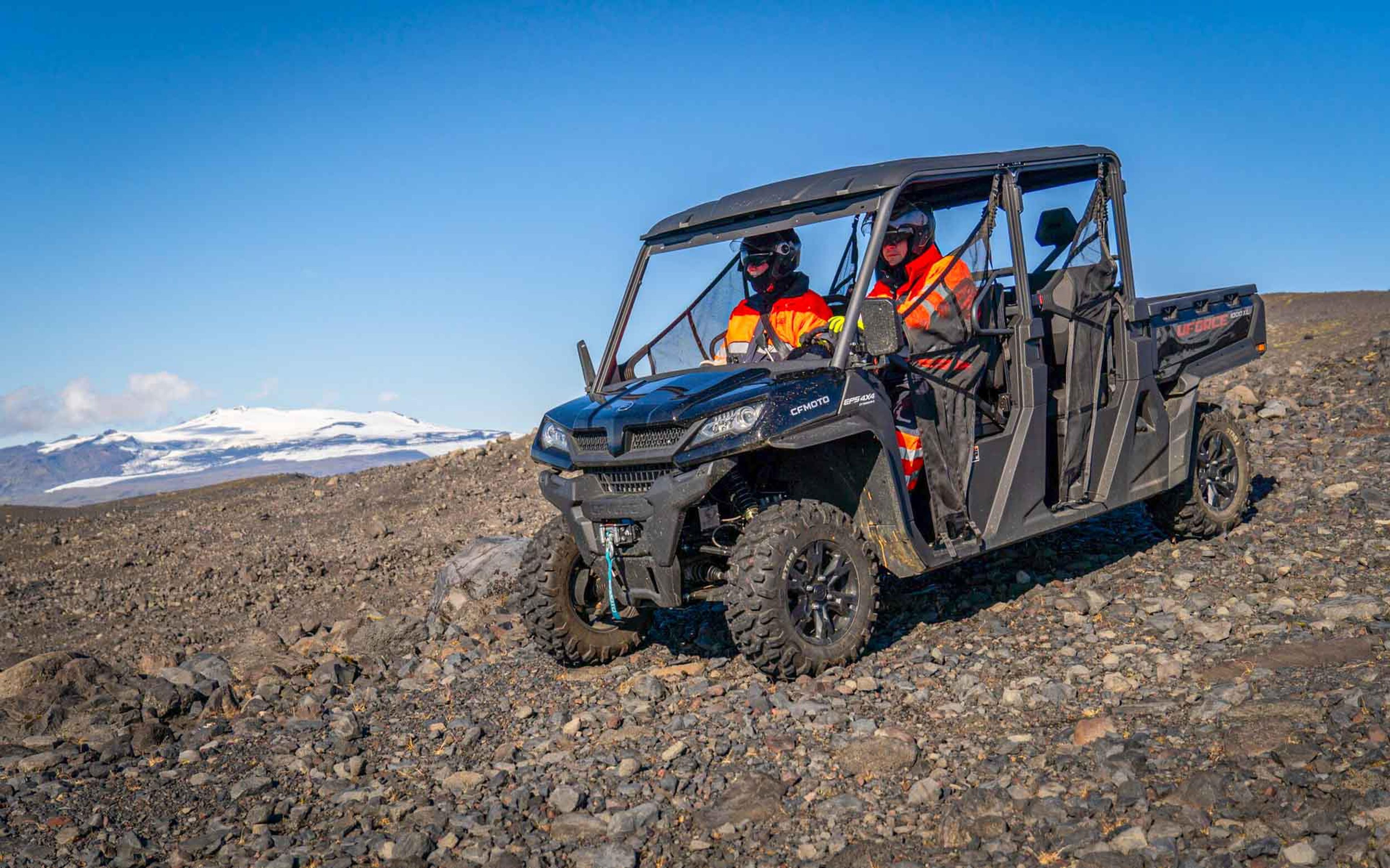 4-seater buggy on an offroad path in Iceland. A glacier on the background.