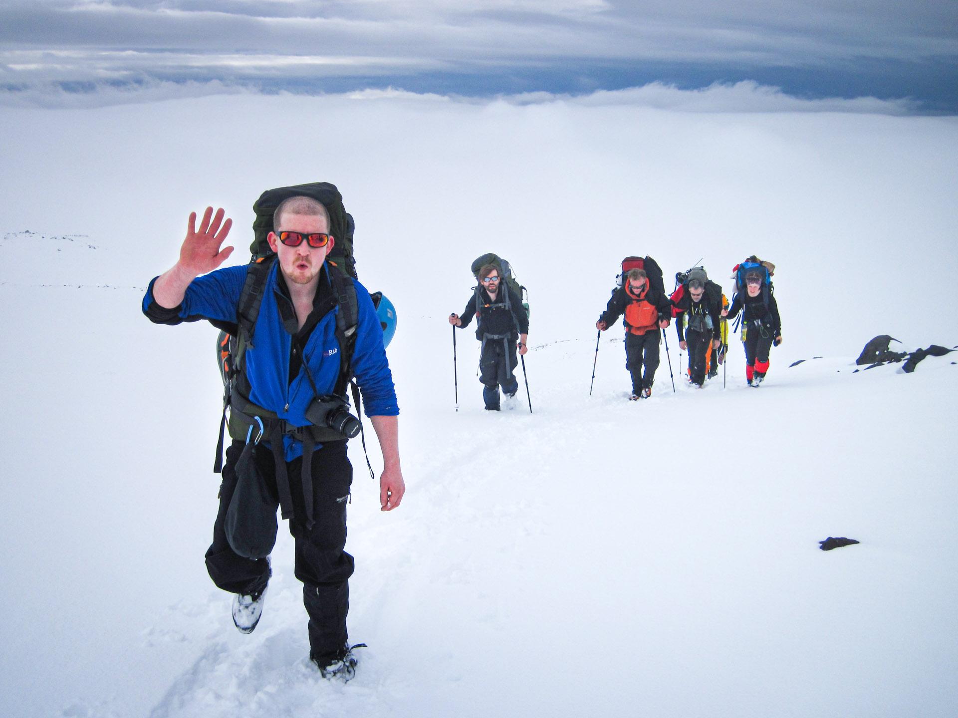 people walking in the snow