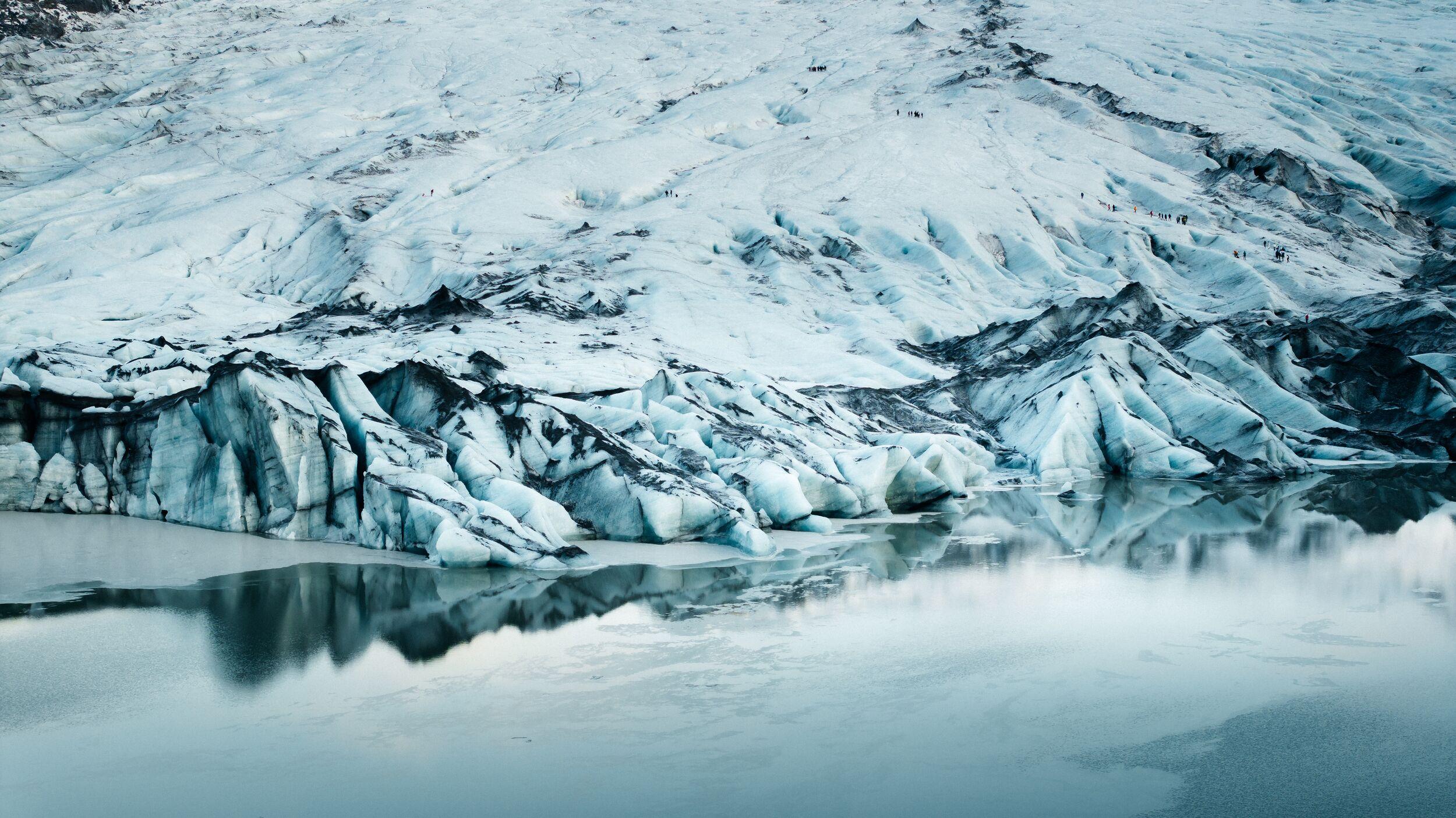 Sólheimajökull glacier at the point where it reaches its accompanying lagoon