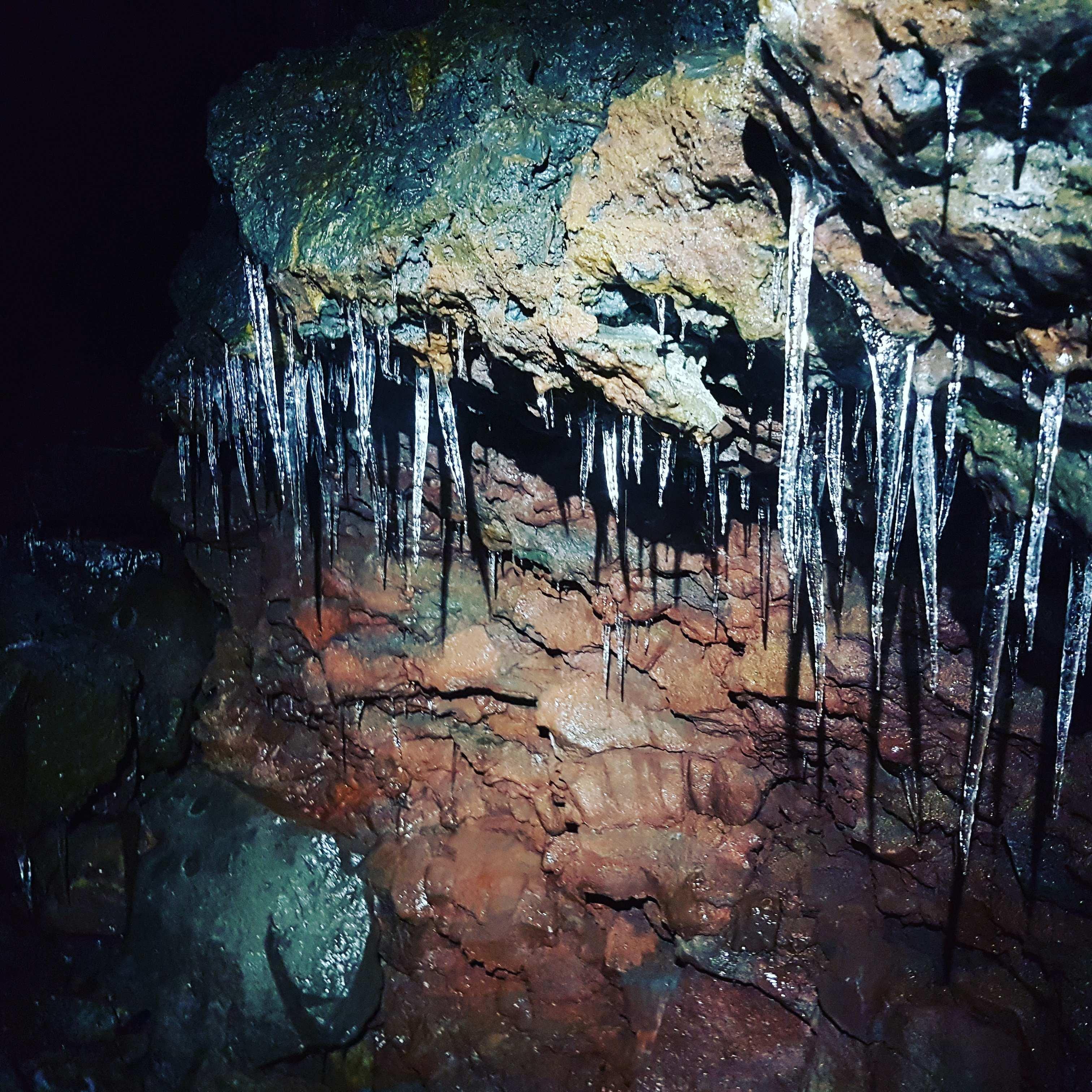 A close up shot of icicles inside the lava tunnel.