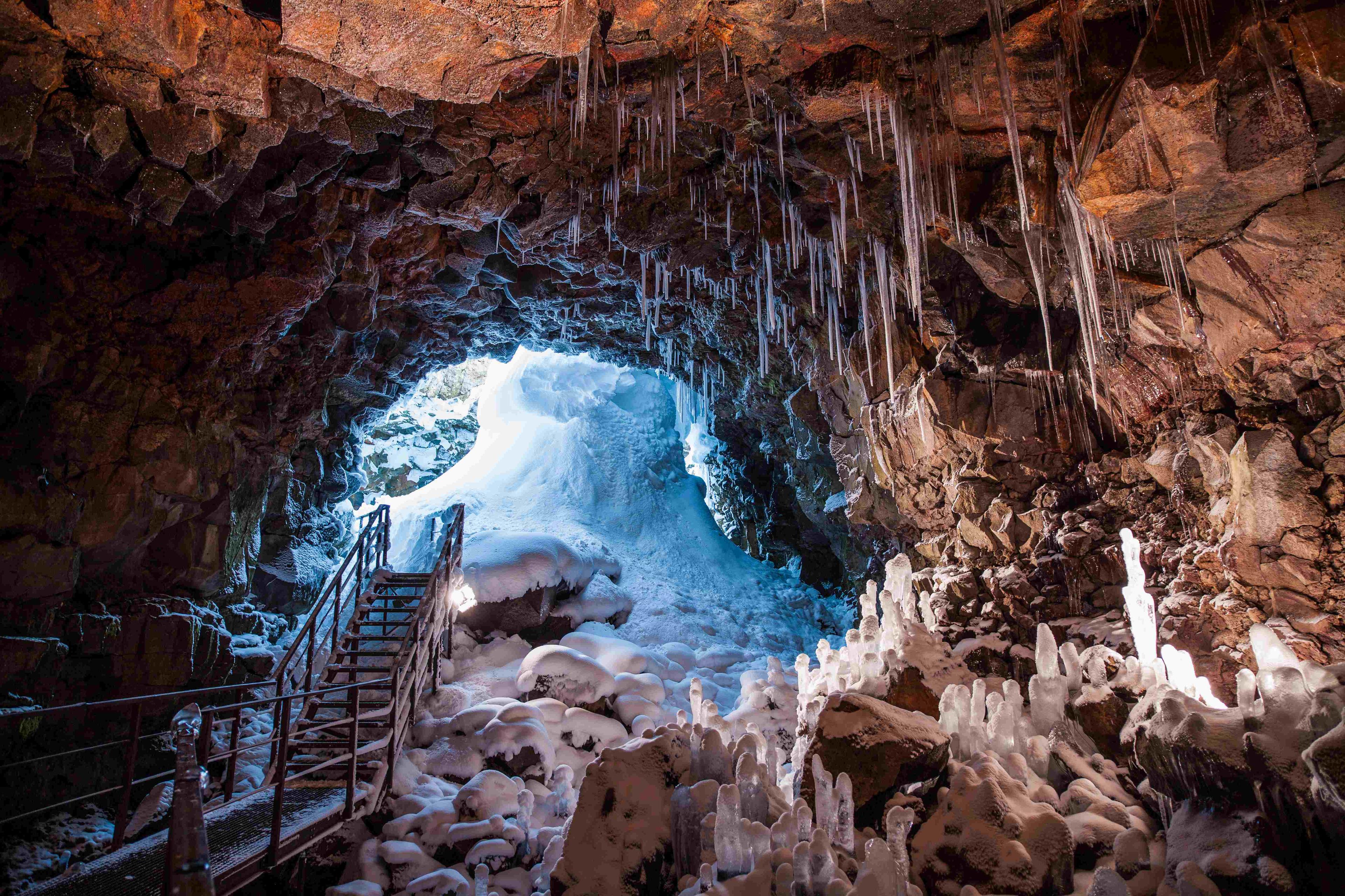 The entrance of the cave with ice crystals on the right hand side