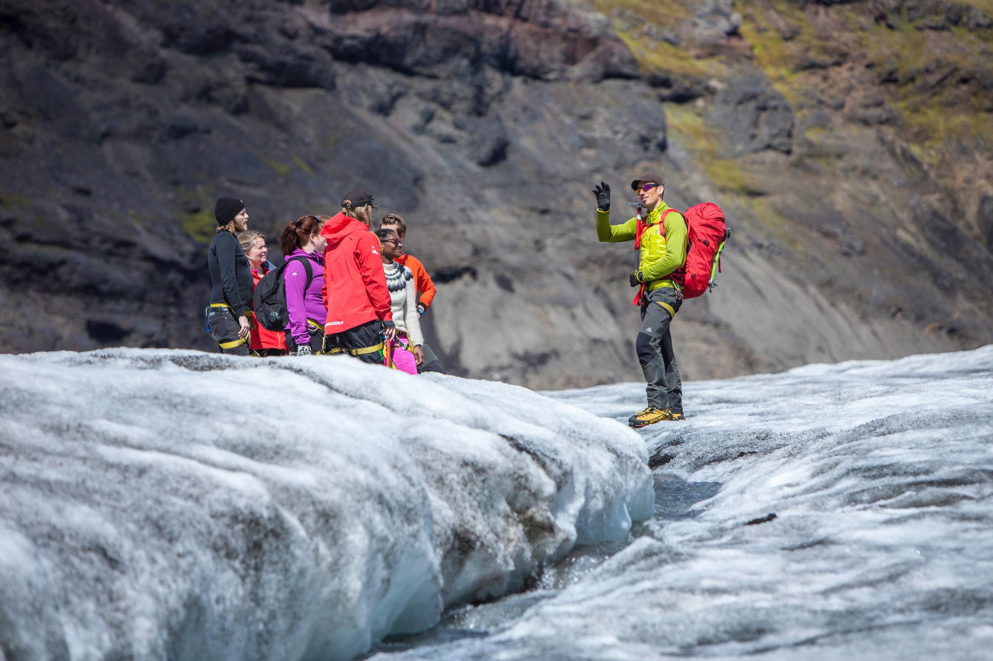 group of explorers and a guide on a glacier in Iceland
