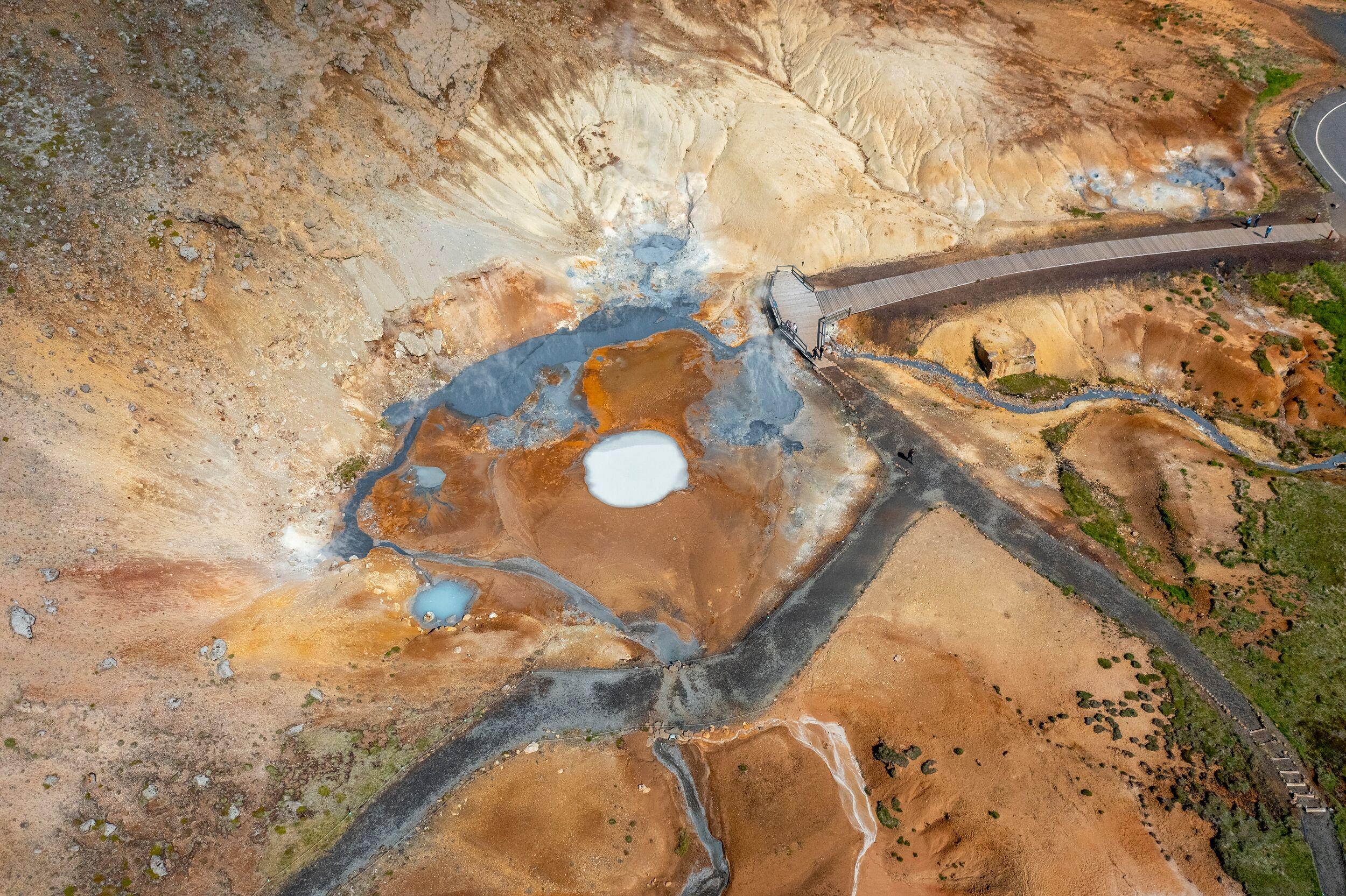 Colorful geothermal pools and lava fields at Seltún, Reykjanes Peninsula.