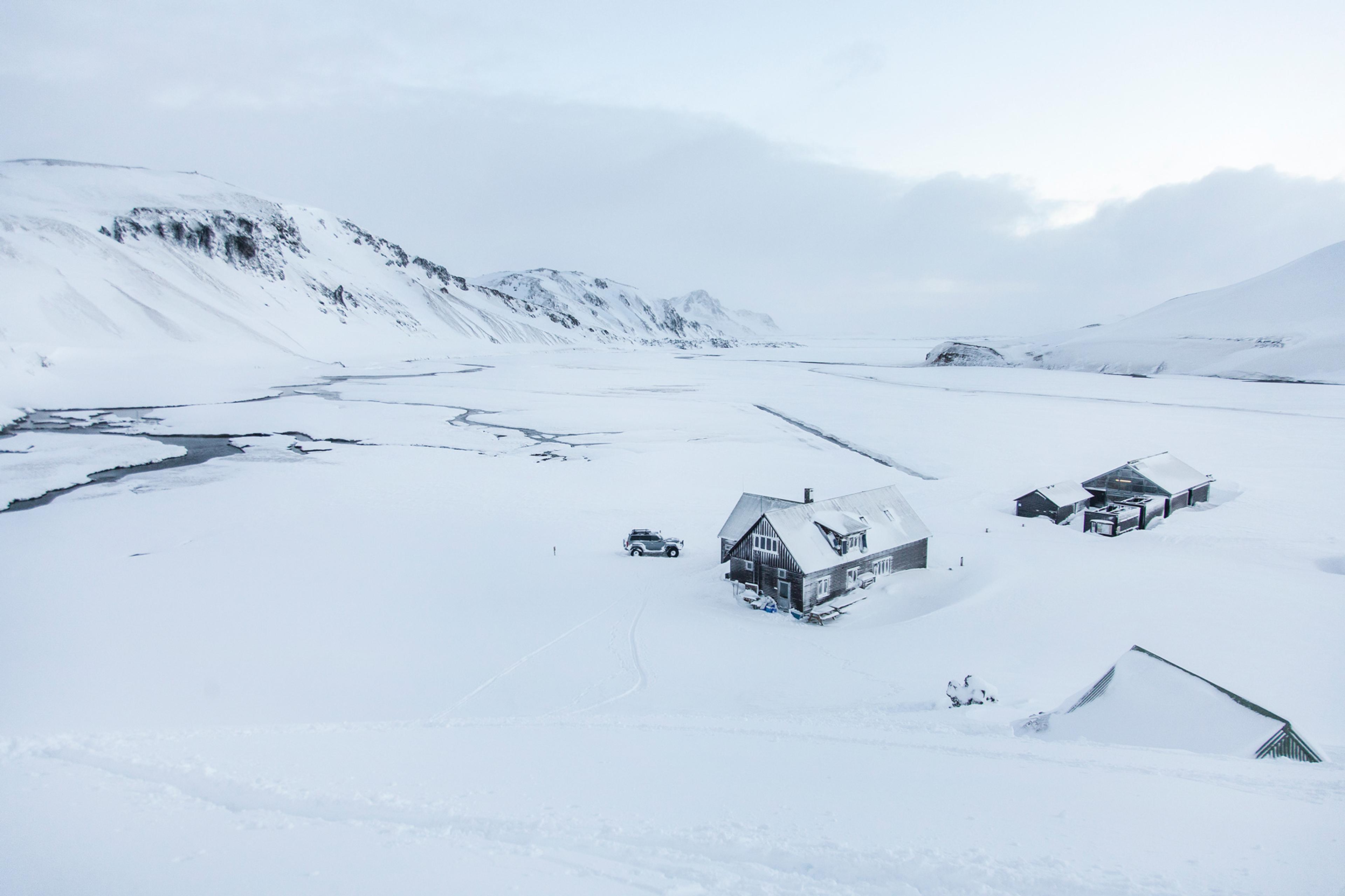 houses in the snowy field 