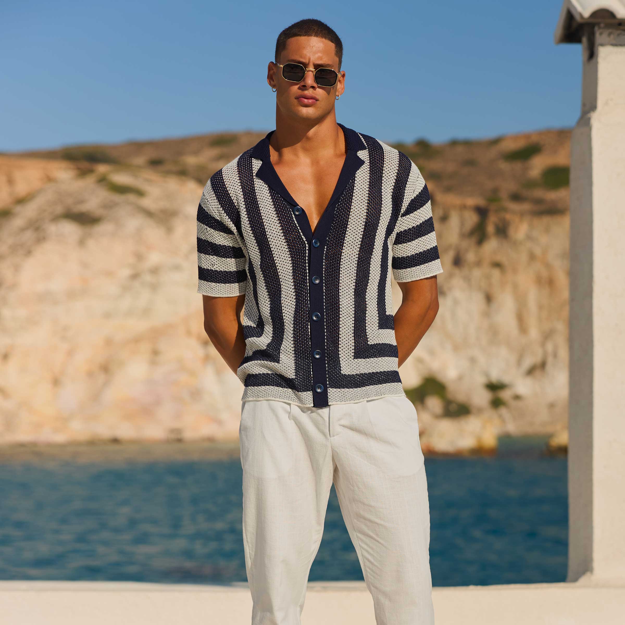 Man in black and white shirt