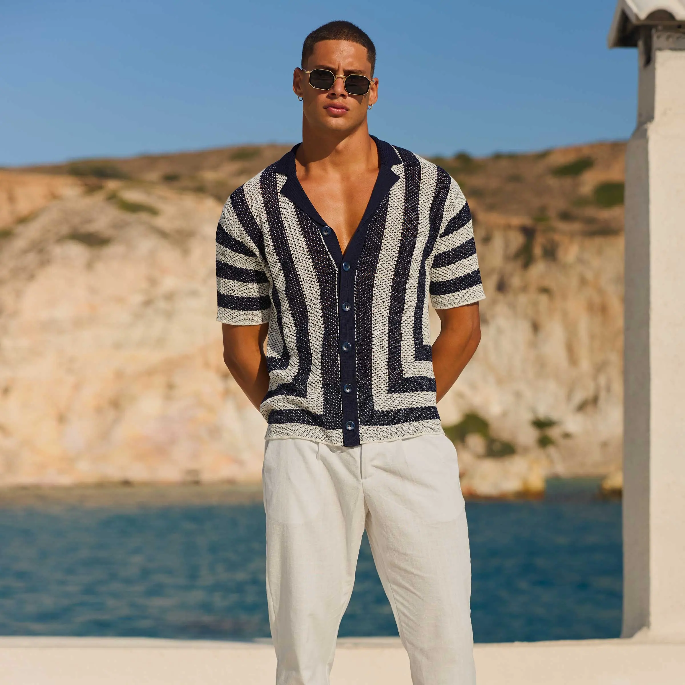 Man in black and white shirt