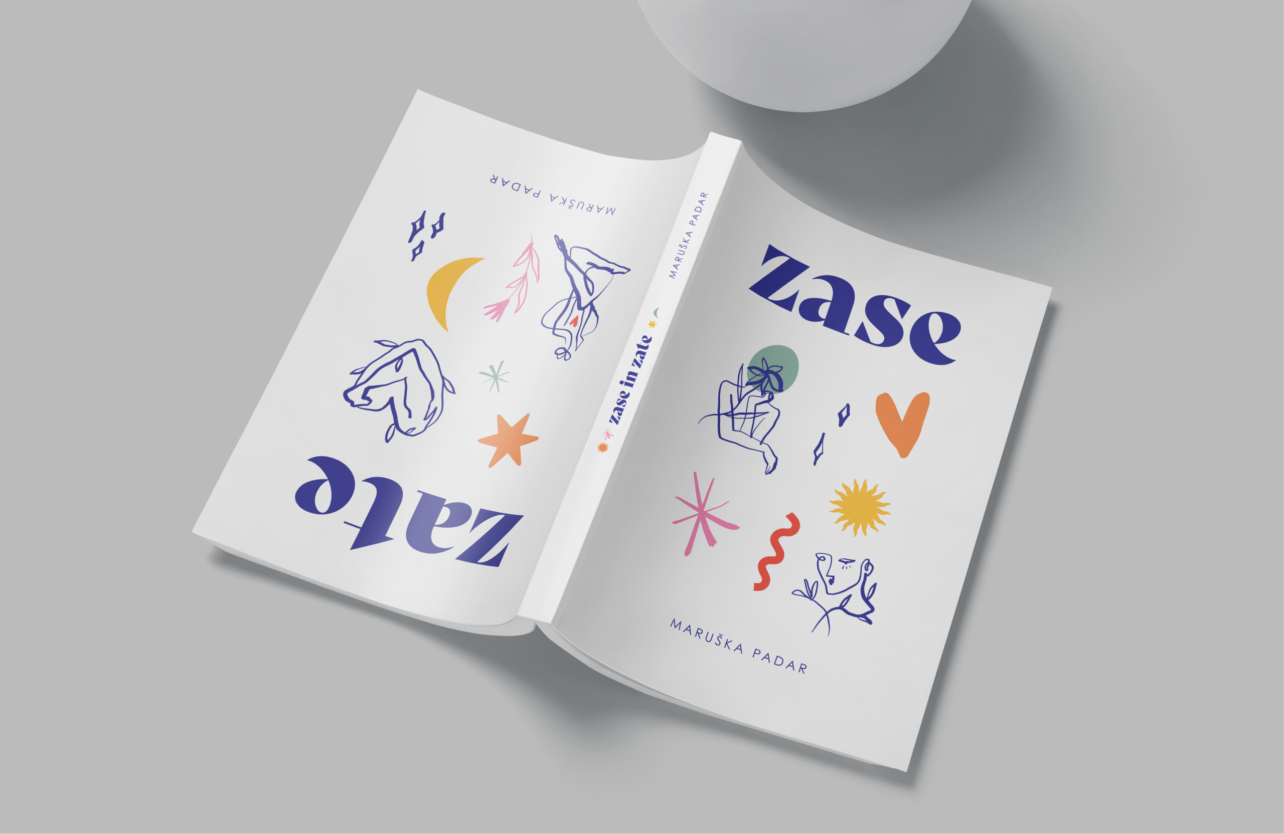 The book opened flat, with "Zase" on the front cover and an upside-down "Zate" on the back.