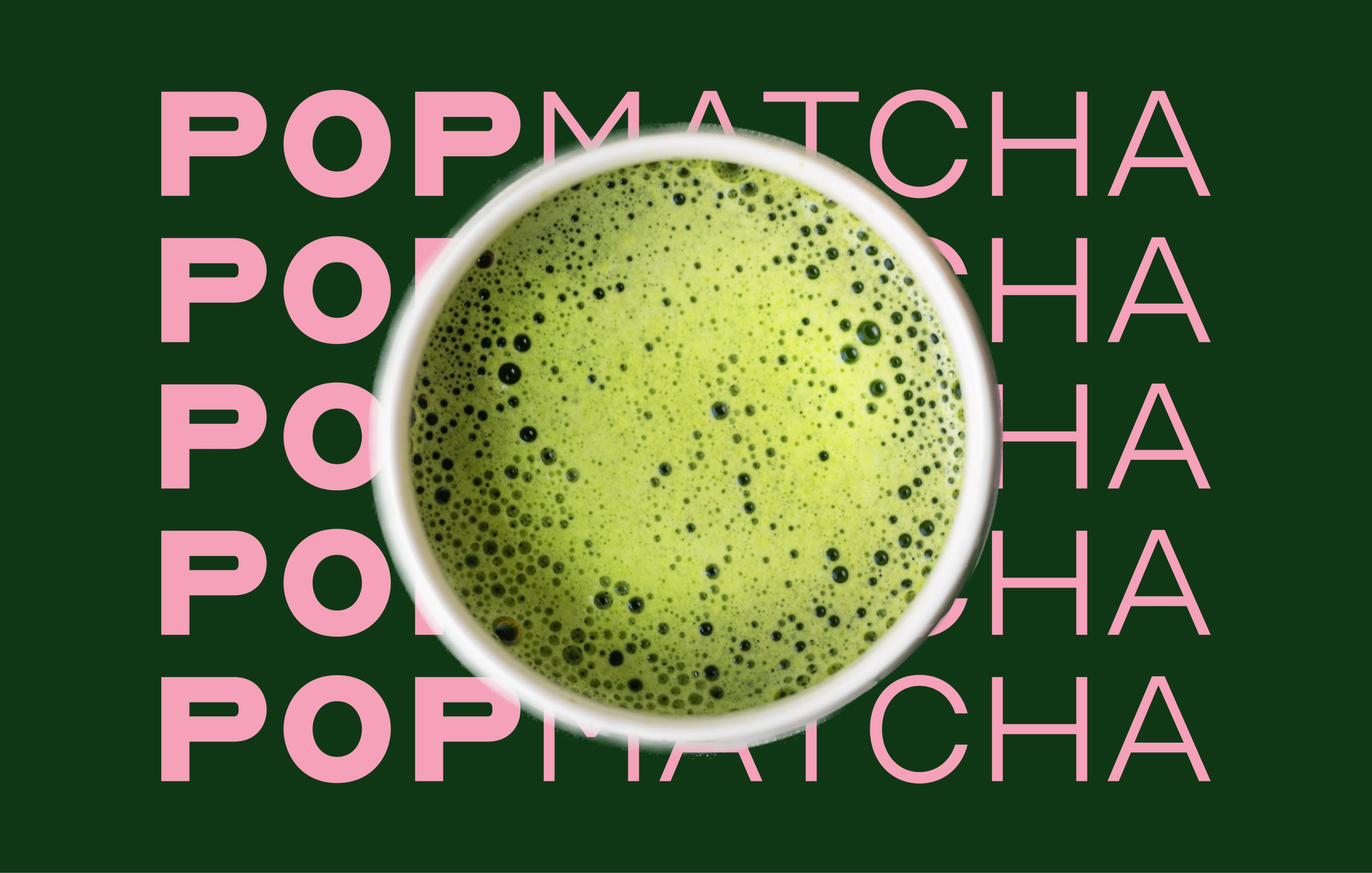 A cup of frothy matcha seen from above, over rows of the pink Pop Matcha wordmark on dark green.