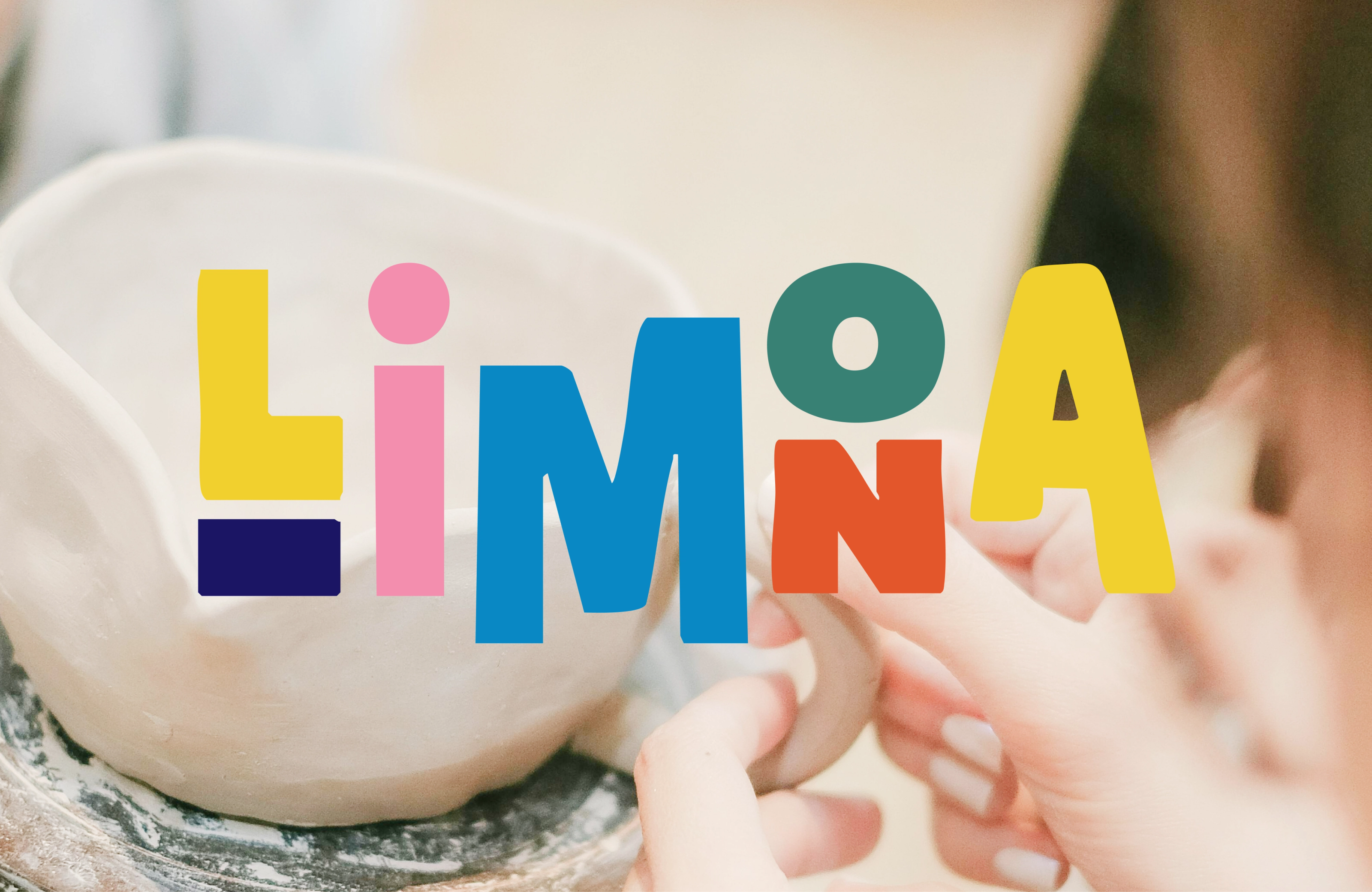 "Limona" in yellow, pink, blue, green and orange letters over hands shaping a white clay cup.