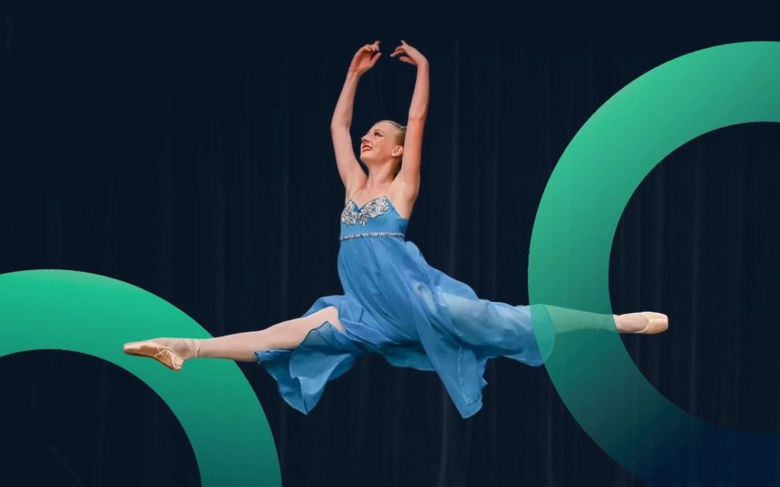 A young ballet dancer mid-leap in a blue dress, framed by Taranaki Youth Boost's green brand rings.