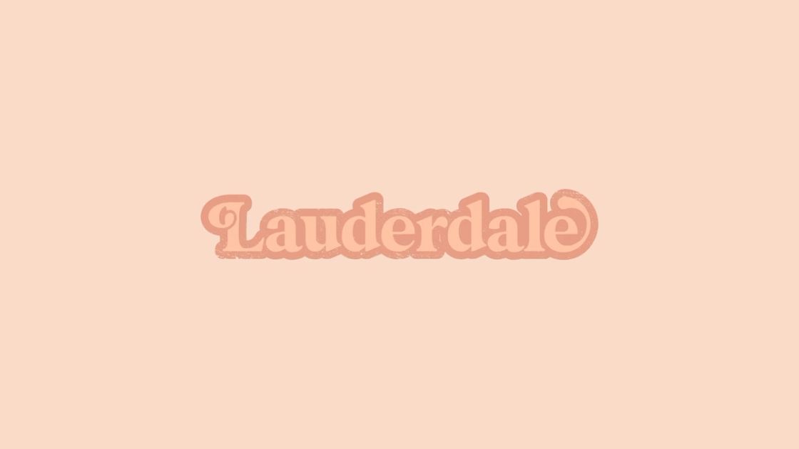 The new Lauderdale logotype, set in a warm retro serif on a peach background.