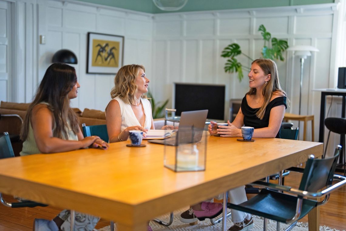 Two Done By Nine marketers planning a campaign together in the studio