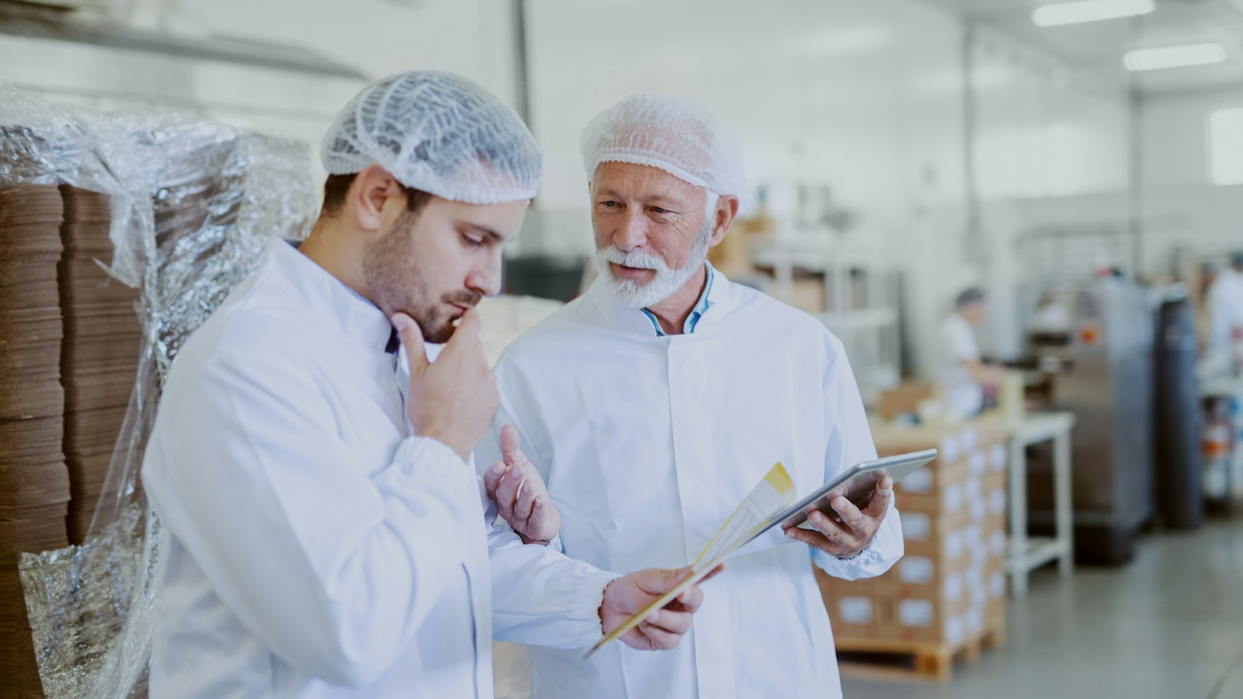Workers discussing compliance
