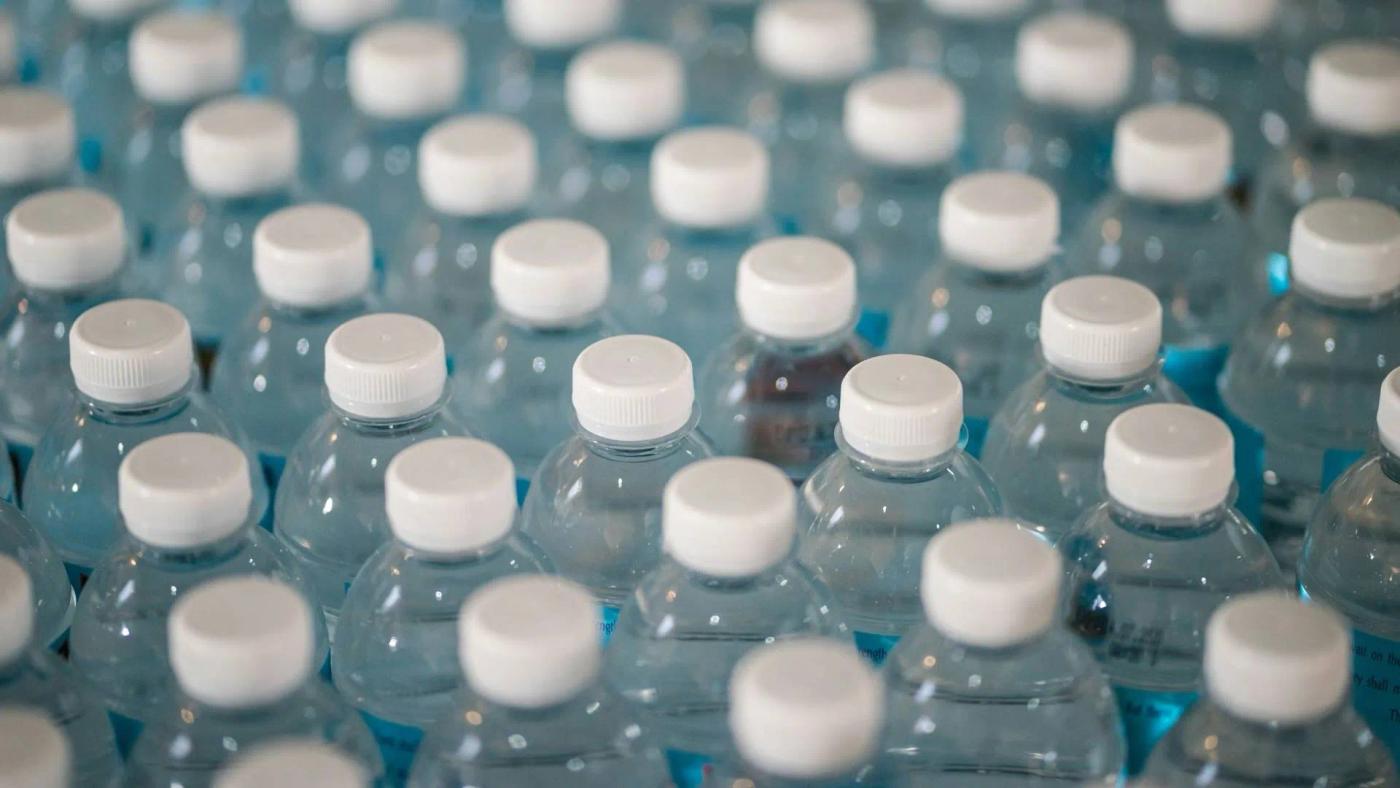 A large collection of water bottles