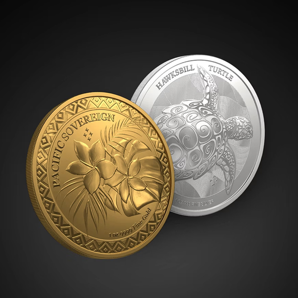 A gold "Pacific Sovereign" coin with flowers and a silver "Hawksbill Turtle" coin.