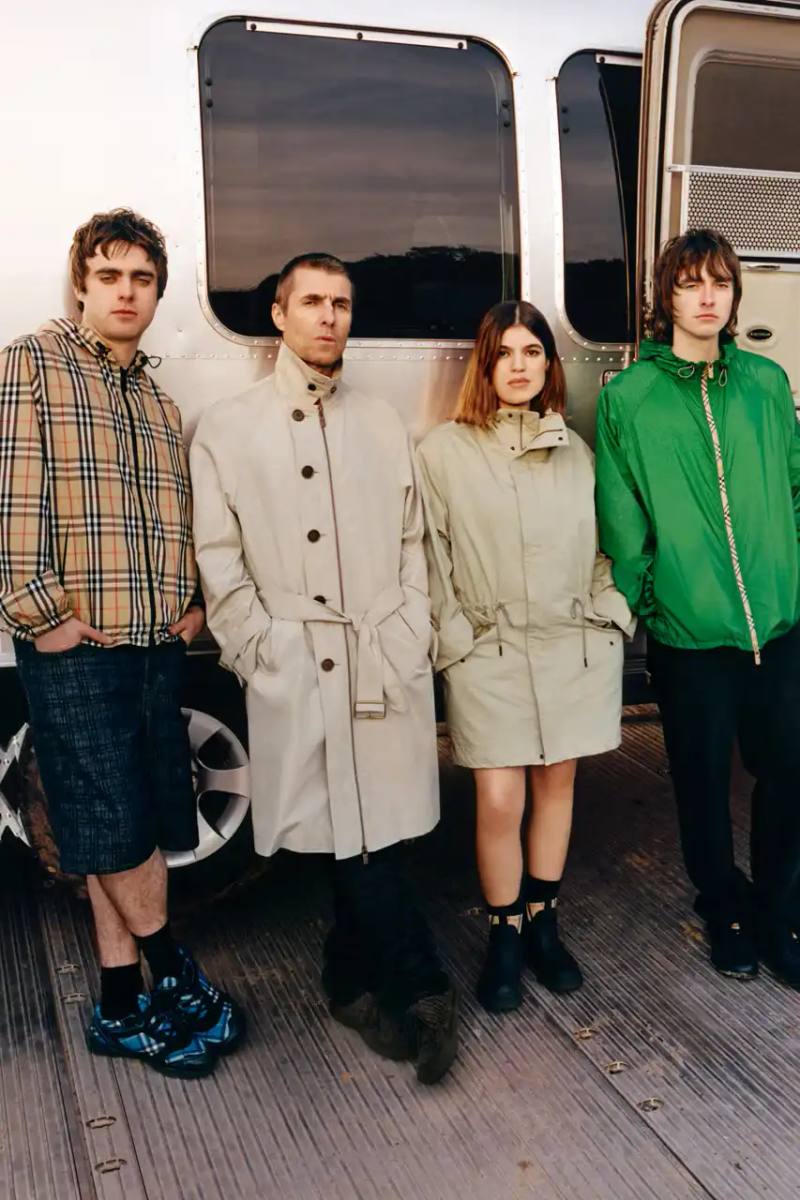 BURBERRY DROPS FESTIVAL COLLECTION FOR WEATHER EXTREMES image about Burberry's festival clothing collection designed for variable weather conditions. Covers campaign featuring multiple celebrities, product details including waterproof and lightweight options, and practical festival footwear. Content includes product descriptions, campaign visuals explanation, and shopping information for festival-goers seeking luxury outdoor wear.