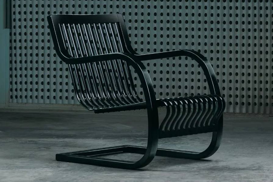 image Overview describing the WILDSIDE Yohji Yamamoto black bamboo chair release.