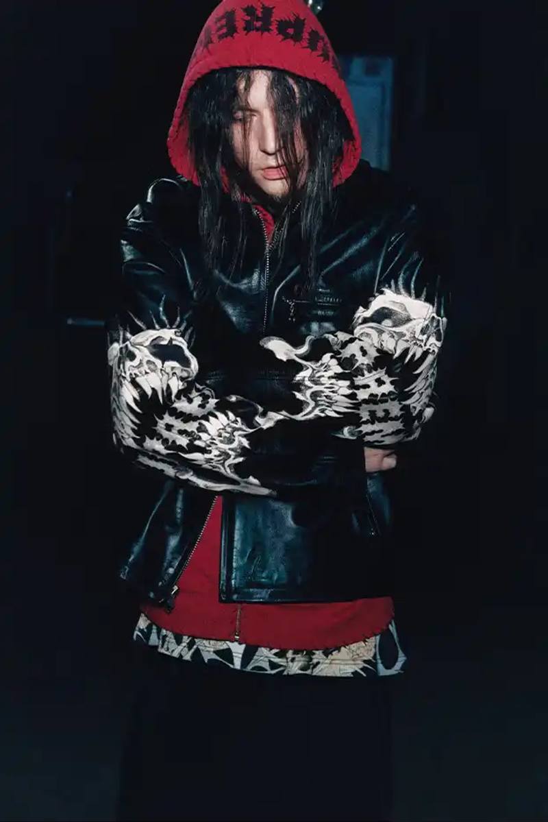 Fashion collaboration image describing Supreme and Y's by Yohji Yamamoto Fall 2025 collection featuring punk aesthetics and skull designs.