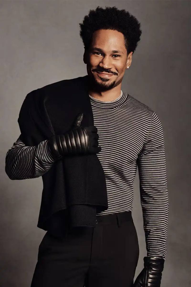 Luis Alberto Rodriguez Kaytranada, Archie Renaux, and Soo Joo Park wearing Giorgio Armani black and navy tailored pieces against a neutral backdrop