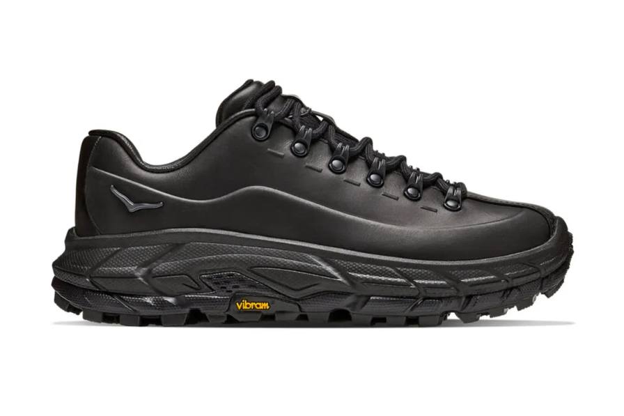 A detailed image breakdown of the HOKA Tor Summit Leather TP in the black colorway describing design elements and pricing.