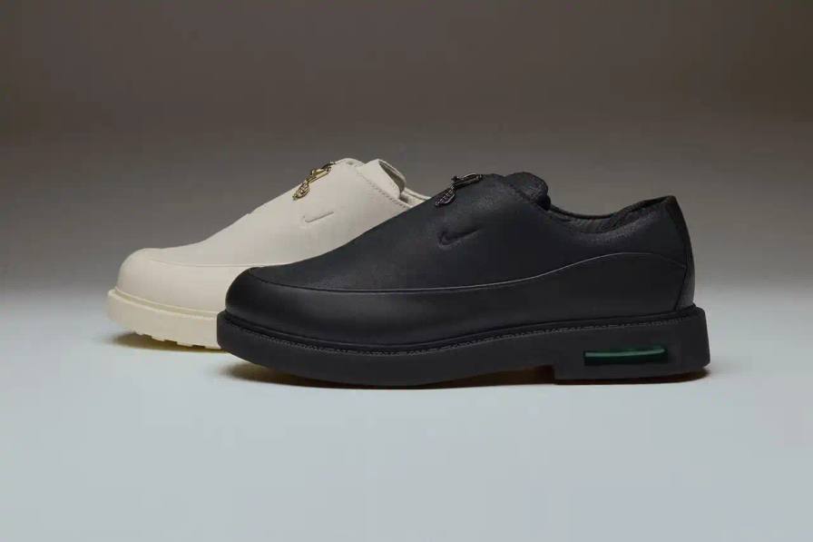 Black and white Air Max RK61 shoes featuring aviation-inspired design elements and Air Afrique branding