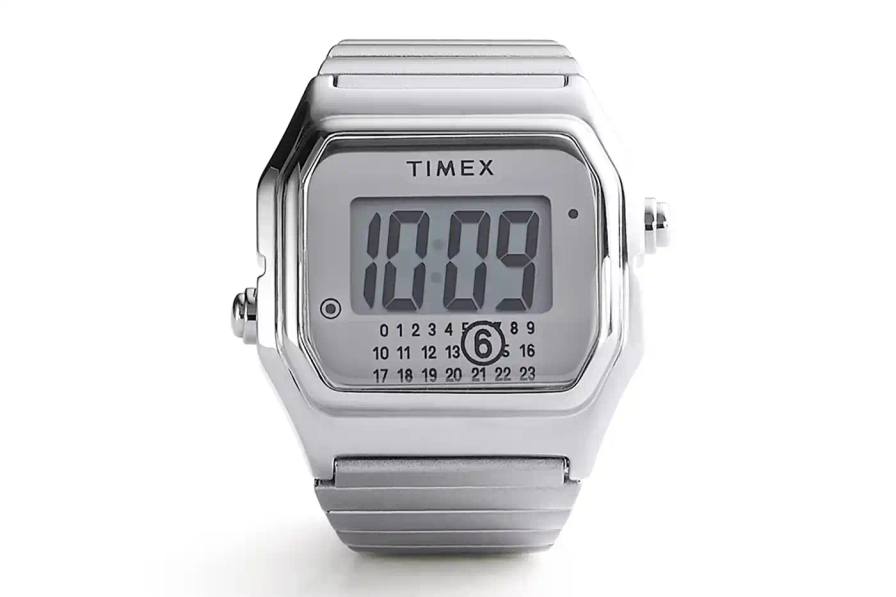 TIMEX X MM6 MAISON MARGIELA LAUNCH T80 DIGITAL WATCH COLLECTION Two Timex x MM6 Maison Margiela T80 digital watches displayed on a light background - a wristwatch and ring watch in mirror-finish stainless steel