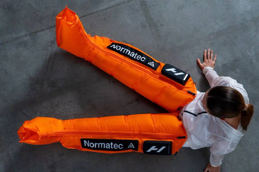 Hyperice and Nike ACG developed exclusive orange Normatec Elite compression therapy systems for Olympic athletes competing in Milan 2026, focusing on recovery during travel and competition.