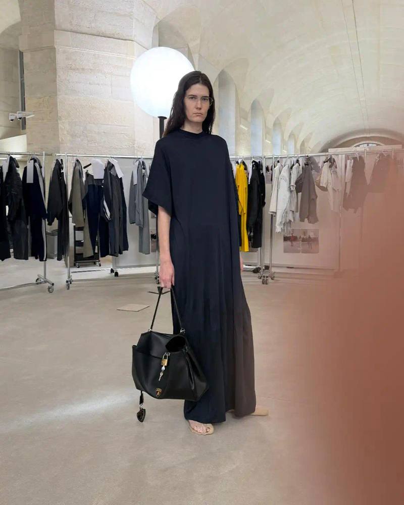 Balenciaga Fashion and automotive collaboration: Balenciaga and Lamborghini collection showcasing leather bombers, racing jackets, and reimagined iconic bags with shield logo details, highlighting aerodynamic design principles and automotive-inspired fashion.