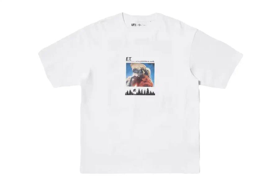 Collection of Uniqlo UT x Universal Pictures t-shirts featuring designs from classic films including E.T. (finger touch scene), Jaws (original poster), Back to the Future (logo), and Casper (1995 film poster), displayed on simple backgrounds.