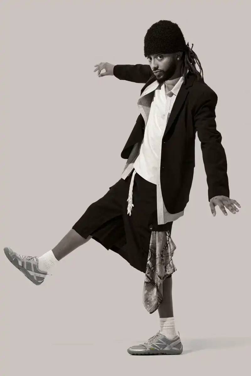 image of the New Balance's annual Gray Days celebration happening throughout May 2025. It details the complete release schedule of gray-colored sneakers and apparel, beginning with multiple models launching on May 1st including the MT10, 740, and 9060. It mentions that brand representatives Aminé and Cameron Brink appear in the promotional lookbook. The article provides specific release dates for notable models like the 1906L sneaker loafer (May 14th), the ABZORB 2010 and 471 silhouettes (May 22nd), Andrew Reynolds' Numeric 933 (May 26th), and the 1300JP (May 29th). Products will be available through New Balance and select retailers, priced between $40 and $330.