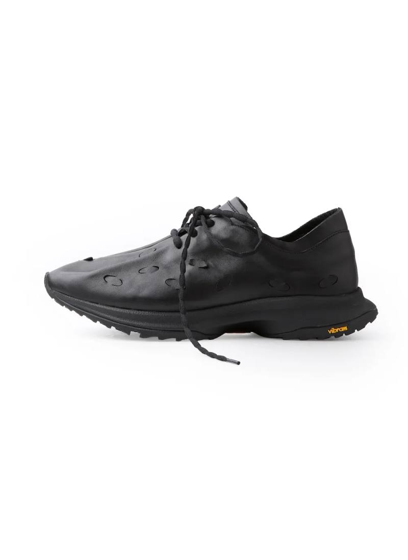 POST ARCHIVE FACTION releases the Petal Trainers. Learn about the Italian leather upper, Vibram MC2 sole, and variable lacing system.