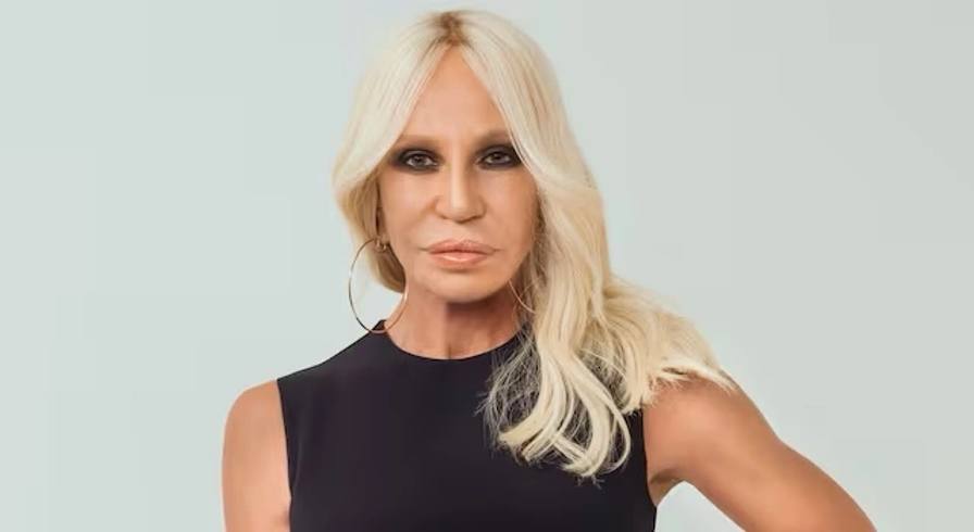 Article analyzing the potential acquisition of Versace by Prada Group, discussing how their contrasting styles - Prada's minimalism and Versace's maximalism - could create a powerful partnership in the affordable luxury market under Andrea Guerra's leadership.
