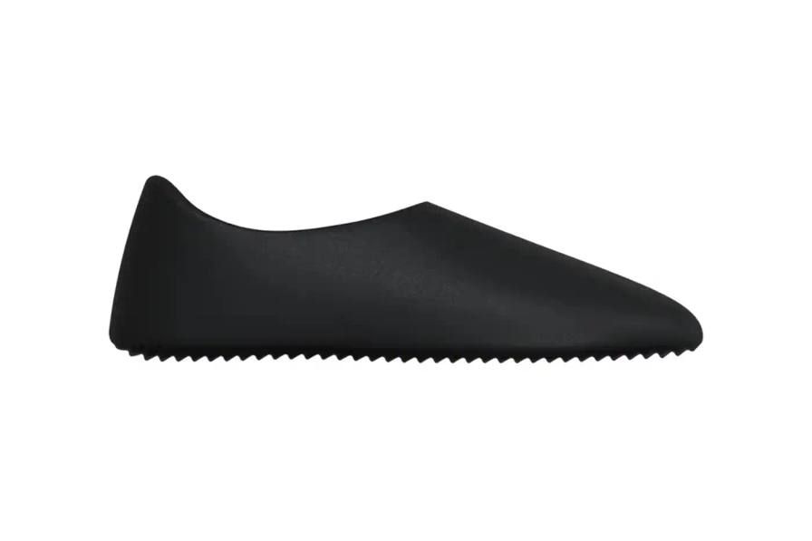 YZY YZY SL-01 shoe in black, featuring a single-piece slip-on design with a sock-like fit