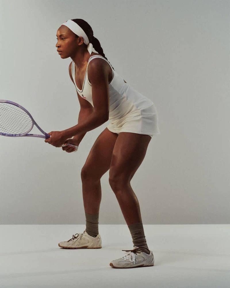 image detailing the performance tennis clothing collaboration between New Balance and Miu Miu worn by athlete Coco Gauff.