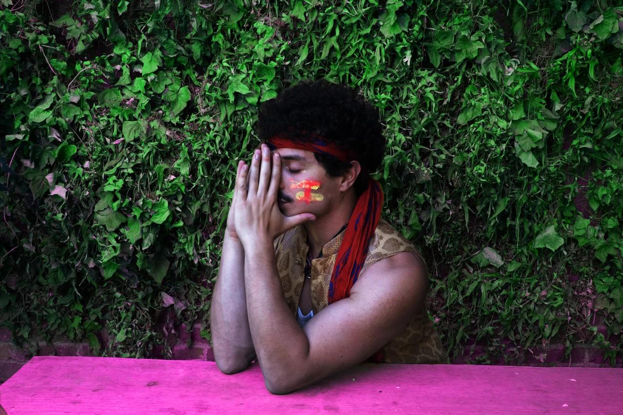 An interview transcript with musician Babymorocco. He discusses recording songs in Andy Warhol's former studio, creating pop art visuals, and developing his Tropico Rocco persona.