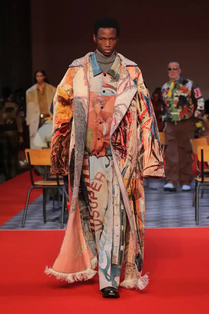 KidSuper Fall/Winter 2026 collection article discussing the brand's new direction with stylist Imruh Asha, featuring a short film with Vincent Cassel and collaborations with Jameson and Havaianas at paris fashion week