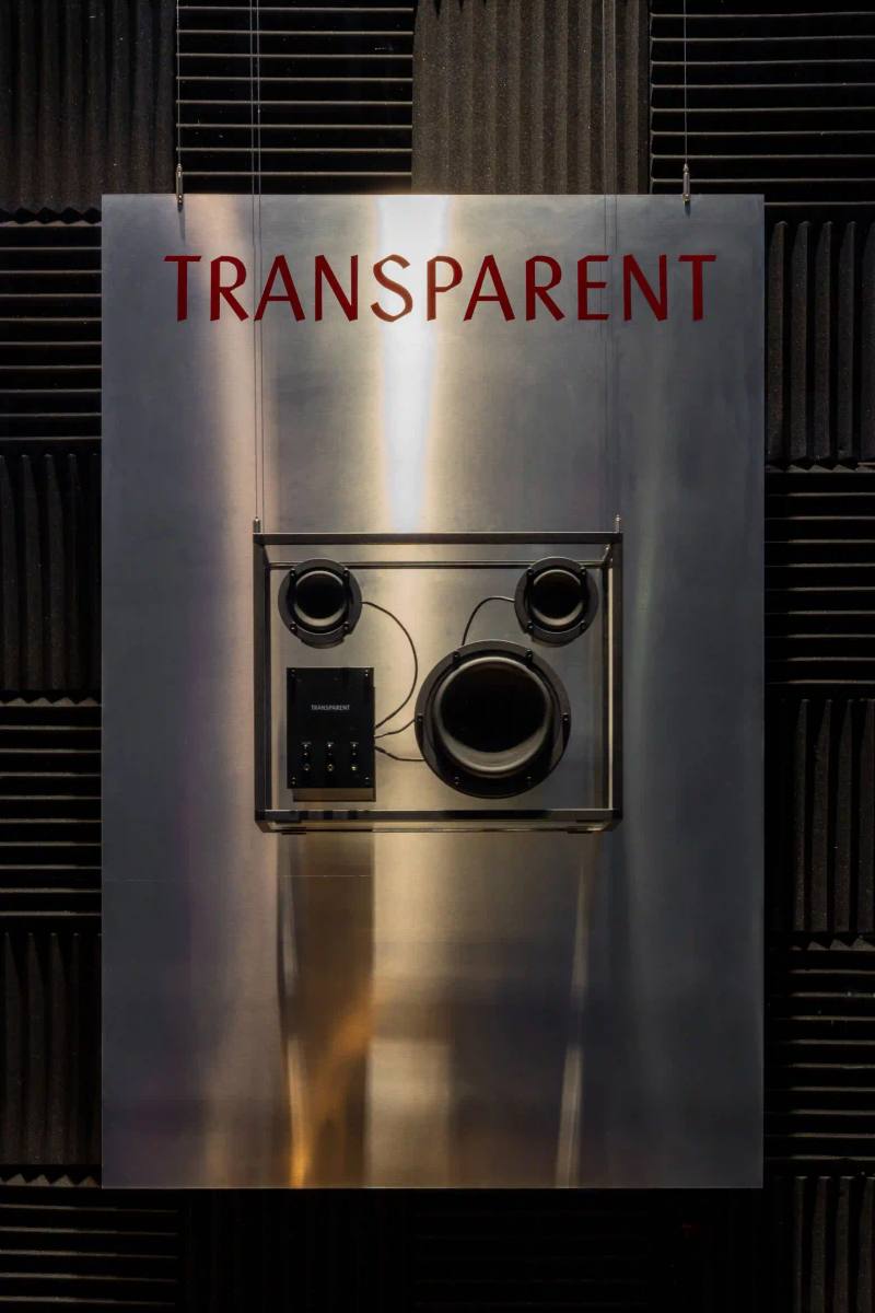 MILANO DESIGN WEEK: ANTONIA AND TRANSPARENT LAUNCH "MUSICAUTOMAT" SOUND INSTALLATION photo about the collaboration between Swedish audio brand Transparent and Milan's luxury fashion boutique Antonia. They've created an installation called 'Musicautomat' for Milano Design Week, located at Antonia's store on Via Cusani 5. The installation resembles a vintage photo booth and lets visitors compare analog and digital sound through Transparent's audio equipment. The article includes quotes from both companies' representatives and notes the installation runs from April 7-13, 2025.