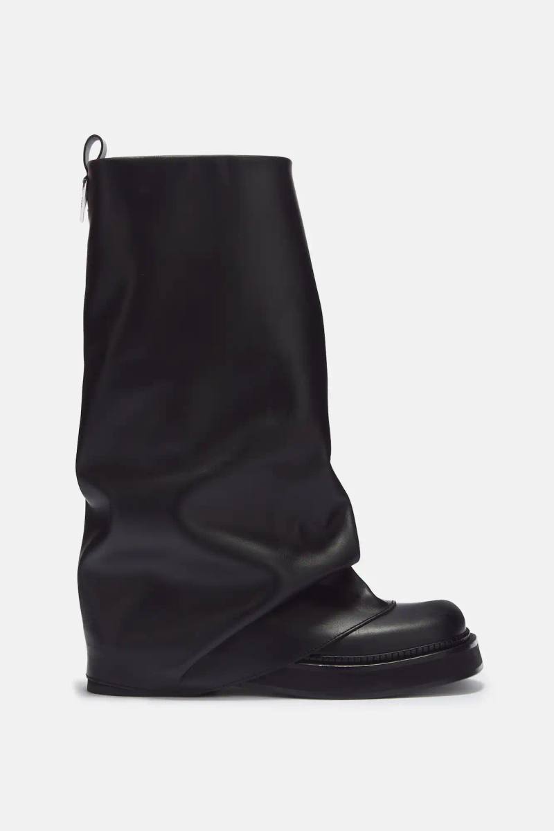 Article about The Attico's Robin Boots designed by Gilda Ambrosio and Giorgia Tordini, available in multiple styles and materials for fall weather.