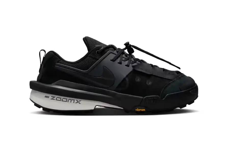 image of the upcoming release of the Nike Zegamadome sneakers, a collaboration with Japanese brand sacai. The article describes the shoe's design features, including its deconstructed aesthetic, materials (suede, leather, textile), and performance elements (Vibram outsole, ZoomX cushioning). It explains how the design incorporates elements from Nike's 1989 Lava Dome hiking boot and maintains signature sacai collaboration features like the double Swoosh logo and extended heel counter. The article details the three available colorways and confirms the May 9th release date through the SNKRS app and select retailers.