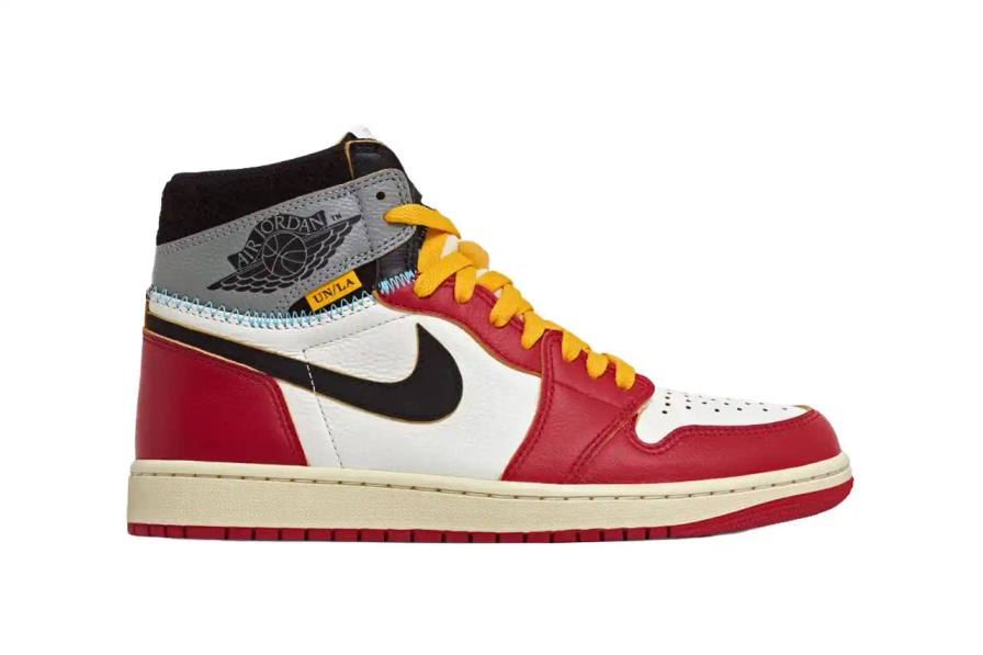 Union LA x Air Jordan 1 High OG sneaker in Varsity Red colorway, showing a leather high-top basketball shoe with red toe box and side panels, black overlays, and grey collar section. The design features distinctive powder blue stitching at the collar seam, a textured paper-like tongue tag, and an aged-look midsole. The shoe combines elements from the classic Chicago and Shadow Air Jordan 1 colorways.