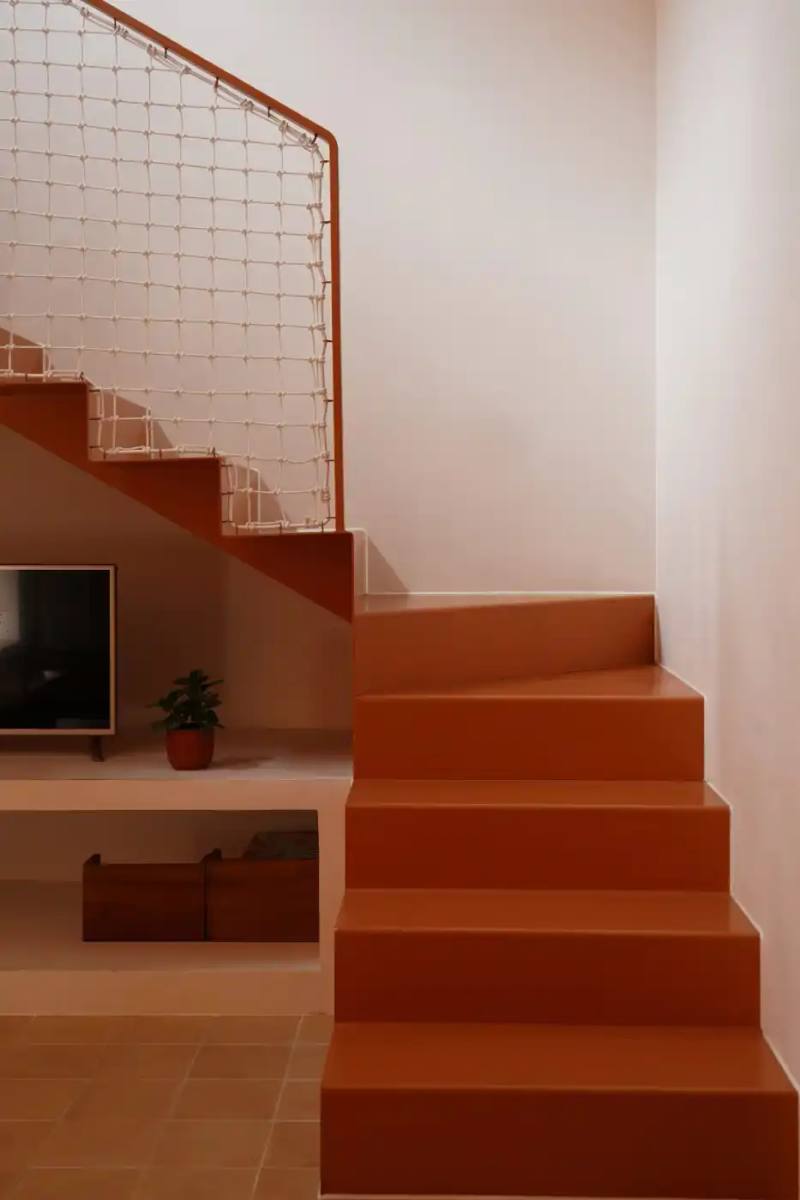TERRACOTTA BRICK HOUSE IN VIETNAM BALANCES VENTILATION & PRIVACY Live Out Studio, A residential house in Da Nang, Vietnam features perforated terracotta brick walls and internal courtyards to provide ventilation and natural light in a narrow urban lot.