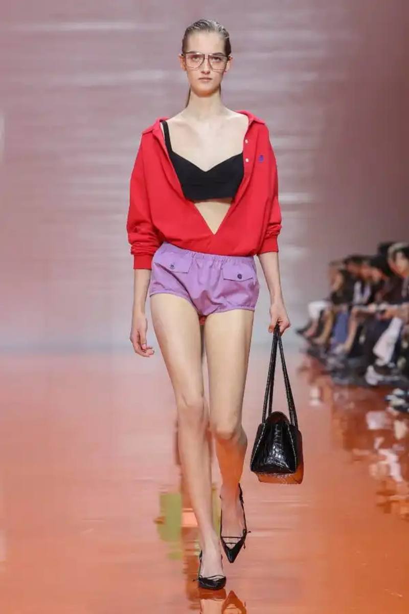 image about Prada's latest women's collection showcased during Milan Fashion Week, focusing on design philosophy and unconventional approaches.