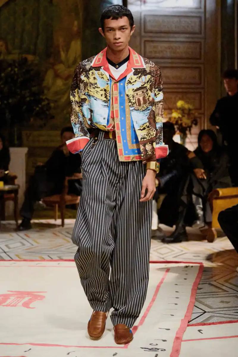 Versace collaborates with Onitsuka Tiger on two footwear designs, the TAI-CHI sneaker and a loafer, both set to release in spring 2026.
