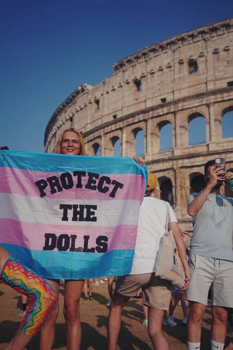 image about Rome's 2025 Pride march, which drew approximately 200,000 participants. The event used the theme "Outlaws" to highlight legal challenges facing LGBTQ+ individuals in Italy, including lack of recognition for rainbow families and transgender rights. The article provides context about similar restrictions in other countries, particularly Hungary's recent ban on Pride events in Budapest. The piece includes quotes from event organizers explaining the significance of the theme choice and describes the march's logistics and scale within Southern Europe. photography by Ada Johnsson 